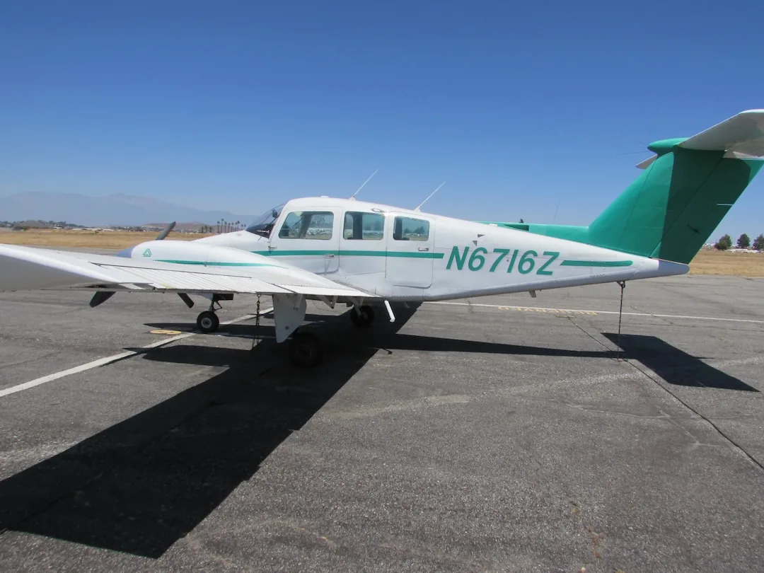 Beechcraft Duchess BE-76 twin-engine training aircraft side profile at Riverside Municipal Airport