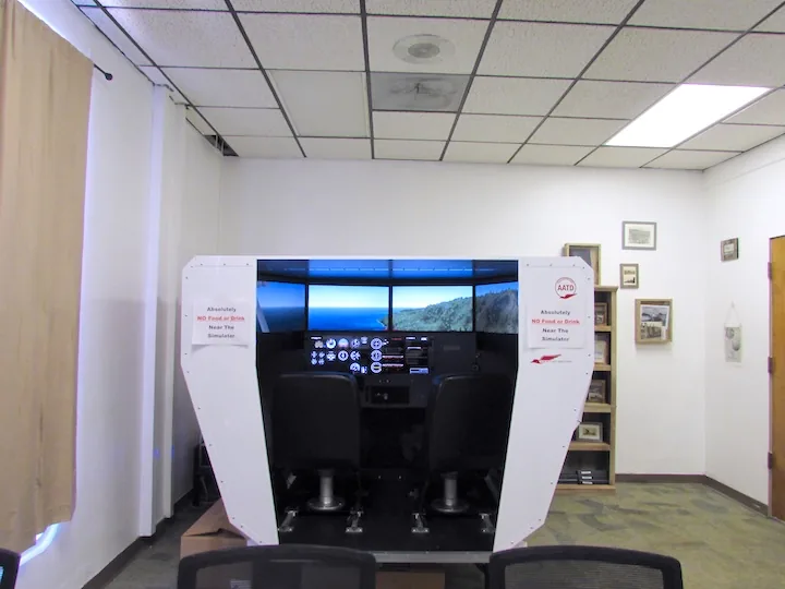 Redbird flight simulator used for procedure training and instrument practice at the academy